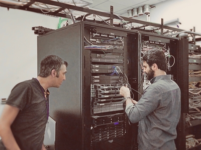 Alan and Armen working on a server